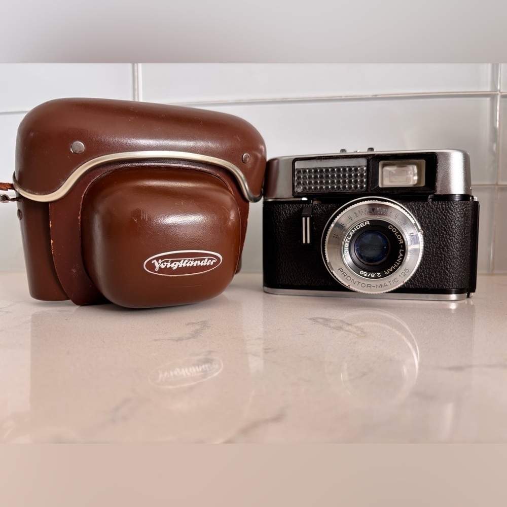 Black and Brown Vintage Voigtlander Vito Camera and Leather Case